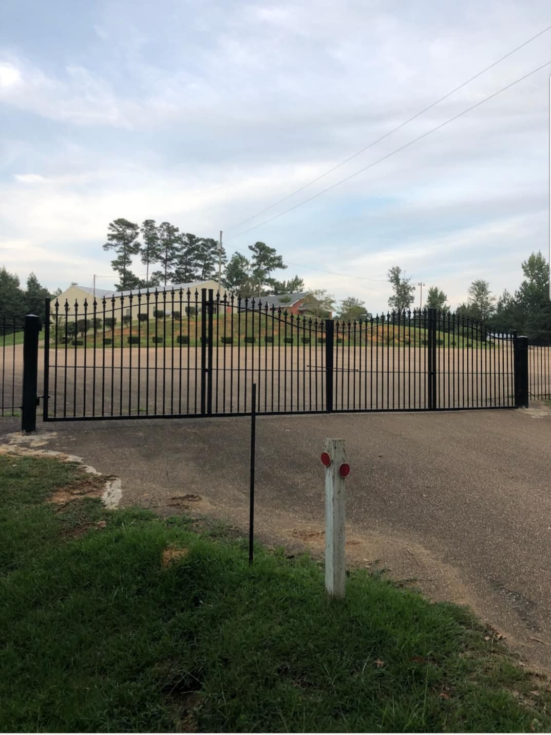 Custom ornamental iron driveway gate